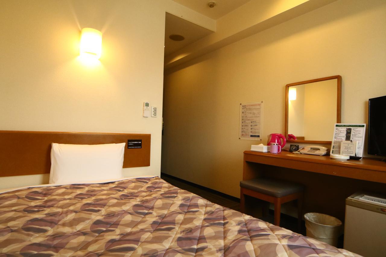 Hotel New Budget Sapporo Bagian luar foto